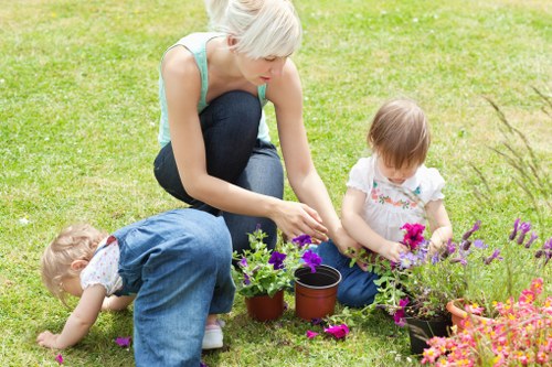 Eco-friendly hedge trimming practices in a lush garden setting